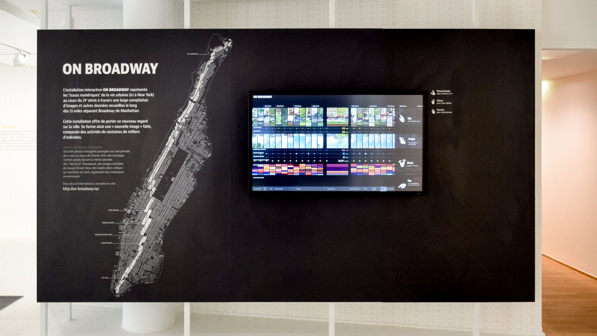 On Broadway installation with a map of Manhattan and touchscreen showing street-level data along Broadway